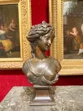 Buste de Bacchante by Élias Robert, Bronze patiné, sold Mar 2024