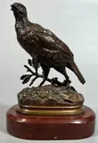 Perdrix by Alfred Dubucand, Bronze à patine brune signé sur la terrasse Socle en marbre rouge, sold Mar 2026