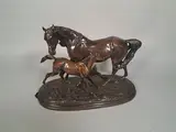 Jument et son poulain by Edouard Paul Delabriere, Bronze à patine brune signé sur la terrasse, sold Mar 2026