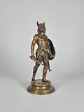 Gaulois by Emile Guillemin, Epreuve en bronze à patine brun rouge nuancé sur un socle à patine dorée signé, sold Apr 2025