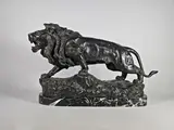 Lion sur un rocher by Jean-Bernard Descomps, Epreuve en bronze à patine brun vert nuancé, sold Apr 2025