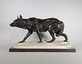 Loup poursuivant le chasseur by Charles Valton, Epreuve en bronze à patine brun nuancé reposant sur une terrasse en marbre blanc imitant l, sold Feb 2025