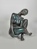 Nu assis by Marie-Paule Deville-Chabrolle, Epreuve en bronze à patine brun nuancé bleu, sold Dec 2024