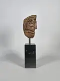 Tête d'homme by Henry de Waroquier, Epreuve en bronze à patine brun clair nuancé, sold Oct 2024