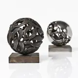 Deux presses papier sphérique by Edgar Brandt, Bronze et socle en acier (Un Signé), sold Mar 2016