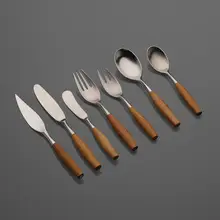 Fjord flatware by Jens Quistgaard, 1953, teak, stainless steel, sold Apr 2023