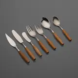 Fjord flatware by Jens Quistgaard, 1953, teak, stainless steel, sold Apr 2023