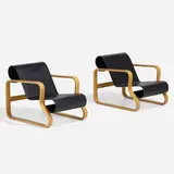 Paimio lounge chairs, pair by Alvar Aalto, birch plywood, lacquered wood, sold Apr 2023