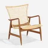 Rare armchair by Ib Kofod-Larsen, c. 1960, beech, caning, enameled brass, sold Apr 2023