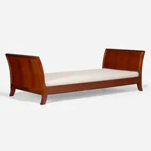 Daybed by attribution Ernst Kühn, c. 1945, mahogany, upholstery, brass, leather, sold Apr 2023