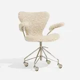 Sevener armchair, model 3217 by Arne Jacobsen, 1955, sheepskin over plywood, chrome-plated steel, sold Apr 2023