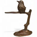 An Art Deco bronze of a songbird on a branch by Roland Paris, bronze, sold Dec 2025