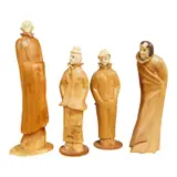 A group of four carved figures by Pierre Decorse, sculpture, sold Dec 2025