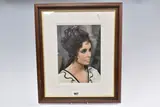a signed and framed studio photograph of the legendary actress in her iconic by Elizabeth Taylor, photograph, offered Apr 2025