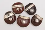 all mounted with white metal hinged covers, strikers, shield cartouches, three by Five Nut Vesta Cases, sculpture, sold Mar 2025