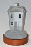 'The Good Life', a limited edition sculpture of a house, mounted by Paul Horton, sculpture, sold Nov 2024