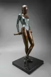 Ballet dance at the barre Signed twice by Jonathan Wylder, Bronze with brown and green patina on a black stone base, sold Dec 2024