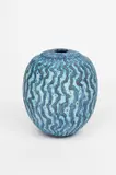Vessel with neck blue wax resist impressed seal marks by Peter Beard, photograph, sold Dec 2024
