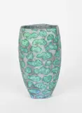 Hexagonal vase with wavy lines wax resist in turquoise impressed seal by Peter Beard, photograph, sold Oct 2024