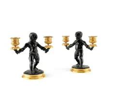 pair of patinated and gilt bronze figural candelabra by Louis Kley, gilt bronze, sold Dec 2014