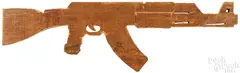Kalashnikov by Leonid Sokov, carved wood, sold Jul 2025