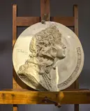 Médaillon circulaire orné du profil de Gaby Deslys en bas-relief by Louis Botinelly, 1920, Plâtre, sold Jan 2026