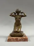 Femme nue agenouillée by Paul Philippe, Épreuve en bronze doré signé, sold Dec 2025