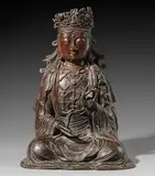 XVE/XVIE SIÈCLE by Guanyin Assise Chine Dynastie Ming, Bronze à patine brune Figurée assise en padmasana, la main gauche effectuant le geste de l, sold Jun 2024