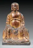 XVIIE SIÈCLE by Immortel Taoïste Chine - Dynastie Ming, Bronze laqué or Assis à l'européenne, les deux mains sur les genoux, sold Jun 2024