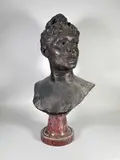 Buste de femme by Léopold Bernhard Bernstamm, Epreuve en bronze à patine brun nuancé, sold Feb 2024