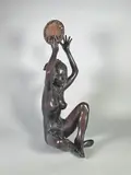 Femme au tambourin by Christian Della Giustina, Epreuve en bronze à patine brun nuancé, sold Feb 2024