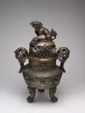 A Very Large Japanese Bronze 'Shishi' Tripod Censer and Cover, Meiji Period (1868-1912) by Japanese Art, A Very Large Japanese Bronze 'Shishi' Tripod Censer and Cover, Meiji Period (1868-1912), sold Apr 2025