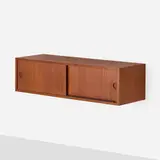 Wall-mounted cabinet by Finn Juhl, c. 1951, teak, sold Apr 2023