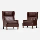 Lounge chairs, pair by Rud Thygesen, c. 1960, leather, beech, sold Apr 2023