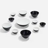 Krenit bowls, set of eleven by Herbert Krenchel, 1956, enameled steel, sold Apr 2023