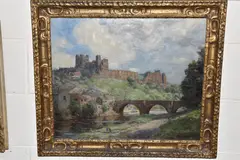View of Richmond Castle from the river with figures on a bridge by Fred Stead, oil on canvas, sold Oct 2024