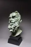 Second Portrait of George Bernard Shaw by Jacob Epstein, Bronze with green patina, on a black stone base, conceived in, offered Jun 2024