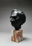 Portrait bust of Bertrand Russell by William Timym, Bronze on a marble base, sold Jun 2024