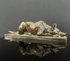 Chien couché by Louis Riché, Épreuve en bronze à patine médaille, sold Nov 2025