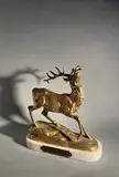 Cerf en liberté by Antoine Aigon, Épreuve en bronze doré, sold Nov 2025
