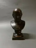 Buste d'Homme by Fanny Dubois-Davesnes, Bronze à patine brune, sold Nov 2023