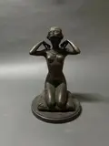 Femme nue agenouillée by Paul Ponsard, Bronze à patine brune XXème siècle H :30 cm, sold Nov 2023