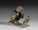 Jeune garçon accroupi observant un lézard by Germaine Oury, Bronze à patine brune, sold Dec 2024