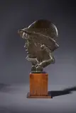 Tête d’enfant by Richard Guino, Epreuve en bronze patiné brun marqué «, sold Oct 2025