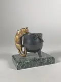 Le chat au chaudron by Louis-Albert Carvin, Epreuve en bronze à patine or et noire, sold Oct 2022