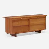 Cabinet by George Nakashima, 1958, American black walnut, chrome-plated brass, sold Mar 2023