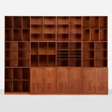 Bookcases, set of twelve by Mogens Koch, c. 1955, mahogany, brass, sold Mar 2023