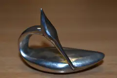 A silver miniature preening grebe study by Guy Taplin, sculpture, sold Dec 2023
