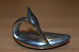 A silver miniature preening grebe study by Guy Taplin, sculpture, sold Dec 2023