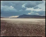Skull and Storm, 1986 Chromogenic contact print, image size 20.2 x 25.4cm by Richard Misrach, Chromogenic contact print, image size, offered Nov 2025